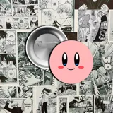 Pin con la cara de Kirby, personaje de videojuego.