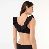 Top de bikini negro de microfibra suave, con escote redondo y volantes decorativos en los tirantes y el frente.