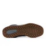 Bota de senderismo Columbia modelo Fairbanks Mid, color gris grafito. Confeccionada con parte superior textil impermeable, cuello y talón de gamuza, puntera reforzada, entresuela amortiguada y suela de caucho con tracción.