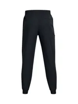 Joggers Under Armour modelo Unstoppable de color negro, confeccionados en tejido técnico elástico con tecnología UA Storm que repele el agua. Presentan corte ajustado en las piernas, cintura elástica con cordón, bolsillos laterales y un bolsillo con cierre sellado en el muslo.