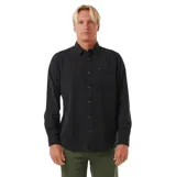 Camisa de manga larga Rip Curl modelo Classic Surf Washed, color negro con efecto lavado. Presenta cuello clásico, cierre frontal con botones y un bolsillo en el pecho con etiqueta de la marca.