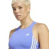 Musculosa de running Adidas Own the Run con cuello alto y corte crop. Diseño liso color lila con logo y tres rayas blancas en el lateral.