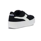 Championes Diadora modelo Bamplat de plataforma, color negro con detalles en blanco y cordones blancos.