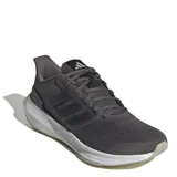 Championes de running Adidas modelo Ultrabounce, color gris oscuro con detalles en gris claro. Presentan un diseño de malla transpirable, mediasuela con tecnología Bounce para mayor amortiguación y suela de caucho resistente.
