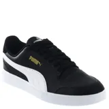 Championes urbanos Puma modelo Shuffle, color negro con detalles en blanco. Presentan una silueta de corte bajo, confeccionados en cuero sintético con perforaciones en la puntera y plantilla SoftFoam+ para mayor amortiguación.