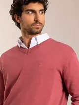 Sweater azul marino de algodón con cuello en V y logo bordado en el pecho.