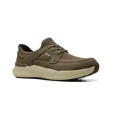 Zapatos casuales Skechers modelo Slip-ins Relaxed Fit Toliver - Vito, color verde militar con suela y entresuela en tono beige claro. Confeccionados con tejido de punto técnico y material sintético, cuentan con cordones elásticos fijos y detalles acolchados.