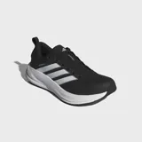 Championes de running Adidas modelo Supernova Ease 2, color negro con detalles en blanco. Presentan empeine de malla técnica ligera, mediasuela Dreamstrike para una amortiguación blanda y estable, y suela de goma con tracción dinámica.
