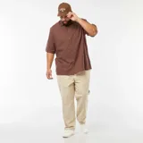 Pantalón chino de corte regular, color beige, confeccionado en mezcla de lino.