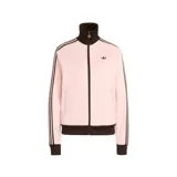 Campera deportiva Adidas con cierre frontal, cuello alto, bolsillos laterales con cierre y puños y ruedo acanalados. Presenta diseño en color rosado con detalles en marrón oscuro, incluyendo las icónicas tres tiras en las mangas y el logo del trébol bordado en el pecho.