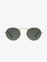 Lentes de sol redondos con armazón de metal dorado y lentes grises.