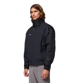 Campera impermeable Columbia Bugaboo II 1986 de color negro, con cuello alto, cierre frontal con solapa, bolsillos con cierre y puños ajustables con velcro. Cuenta con tecnología Omni-Tech y logo de la marca bordado en el pecho.