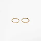 Caravanas de oro 18k con forma ovalada y engaste de brillantes.