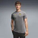 Remera deportiva gris de manga corta Puma, modelo CAP, con cuello redondo y detalles en amarillo. Incorpora el escudo del Club Atlético Peñarol y el logo de la marca en el pecho.