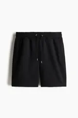 Short de felpa liviana con interior cepillado, cintura elástica con cordón de ajuste, bolsillos laterales y bolsillo trasero insertado.
