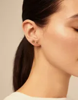 Aro piercing dorado con forma de mano de Fátima.