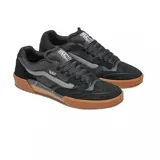 Championes Vans modelo Skate Ave 2.0, de diseño técnico con base negra y suela de goma color caramelo. Presentan una estructura combinada de gamuza y malla transpirable, con la icónica franja lateral de la marca en tono gris y tecnología UltimateWaffle en la suela.