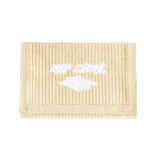 Billetera de pana color beige con cierre de velcro, logo de la marca bordado en blanco en el frente.