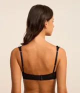 Soutien negro sin aro, confeccionado en encaje con detalle de tul en los breteles y contorno superior de las copas.