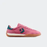 Championes Converse Run Star Trainer color rosa con detalles en verde.