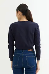 Sweatshirt gris claro de algodón, de corte clásico y manga larga.