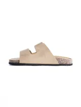 Sandalia de dos tiras con cierre de velcro, confeccionada en material símil cuero color gris. Cuenta con plantilla anatómica con base de corcho y suela de goma negra.