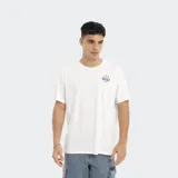 Remera blanca de corte oversize con logo Reef estampado en el pecho.