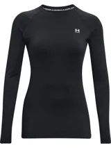 Remera térmica deportiva Under Armour modelo CG Authentics Crew, color negro, de manga larga con diseño raglán, cuello redondo y ajuste ceñido. Cuenta con el logo de la marca estampado en el pecho en color blanco.