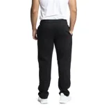 Pantalón de jogging negro con cintura elástica y logo de Umbro estampado en blanco en el muslo izquierdo.