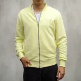 Campera bomber amarilla de algodón con cierre frontal y bolsillos laterales.