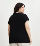 Blusa tipo muscle tee de corte holgado, confeccionada en tejido rib acanalado, con escote redondo y diseño sin mangas.