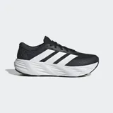 Championes de running Adidas Galaxy 8, de color negro con las tres tiras características en blanco en los laterales y entresuela gruesa de amortiguación blanca.