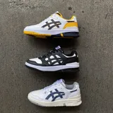 Championes Asics modelo EX89, de diseño retro inspirado en el básquetbol, con combinación de colores blanco y negro. Presentan una estructura de cuero con perforaciones en la puntera, cordones al tono y suela de goma resistente.