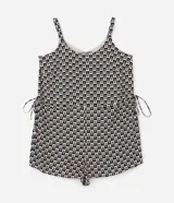 Enterito corto de viscosa con estampado de cuadros y cocoteros, escote en U y breteles ajustables. Tiene lazos laterales en la cintura.