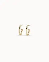 Aros tipo argolla con diseño orgánico e irregular, bañados en oro de 18k.