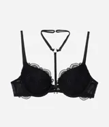 Soutien negro con base estructurada, confeccionado en tul con textura floral. Cuenta con aro de soporte, detalles de arneses y argollas metálicas frontales, y breteles ajustables.