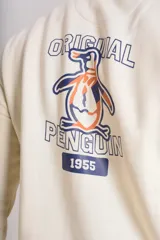 Buzo de cuello redondo en color beige claro, confeccionado en tejido de algodón. Presenta un diseño minimalista con el logo bordado de la marca en el pecho y puños acanalados.