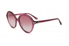 Lentes de sol de armazón grueso y forma redonda/oversize, color rosa translúcido. Las micas son degradadas en tonos rosados. La marca 'mistral' está visible en la patilla.