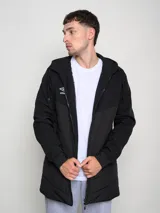 Parka larga de abrigo Umbro color azul marino con capucha y cierre frontal con cremallera.