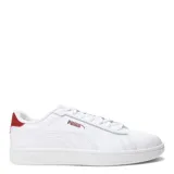 Championes urbanos Puma Smash 3.0 L, de diseño clásico en color blanco con la icónica franja lateral en negro y logo en dorado. Presentan suela de goma en tono crema y cierre mediante cordones.