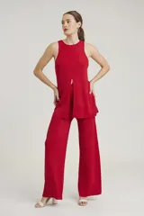 Pantalón de lurex rojo de corte palazzo.