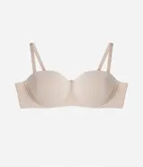 Soutien strapless de microfibra color beige, con copas estructuradas y diseño sin tirantes.