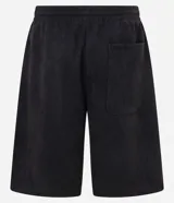 Bermuda masculina color negro, modelo baggy, confeccionada en algodón con cintura elástica ajustable mediante cordón. Presenta bolsillos y detalles de recortes.