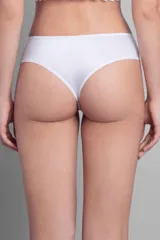 Culotte blanco de tiro medio/alto confeccionado en puntilla elastizada y cola en Lycra. Detalles de piel descubierta en parte delantera, con tiras finas.