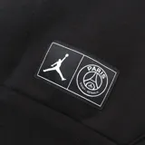 Canguro con capucha Jordan de la colección Paris Saint-Germain, color negro con franja horizontal verde y blanca en el pecho y logo central. Cuenta con bolsillo tipo canguro frontal y etiqueta con logos de Jordan y PSG en la parte inferior.