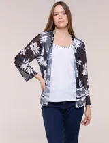 Cardigan abierto con blusa interior blanca, confeccionado en tejido de tul semitransparente con estampado animal print en tonos marrón y blanco, mangas 3/4 y escote redondo con detalles metálicos.