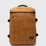 Mochila urbana de diseño funcional en color tostado, con exterior de algodón encerado y detalles en negro. Cuenta con compartimento principal con cierre, bolsillo frontal vertical, bolsillo superior de acceso rápido y correas laterales de ajuste. Incluye compartimento acolchado para computadora y manija superior reforzada.