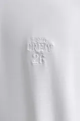 Camiseta de entrenamiento Zara Athleticz de corte regular, confeccionada en tejido técnico elástico y ligero con estructura. Presenta cuello redondo, manga corta con detalle de parche, costuras planas y logo estampado en el pecho.