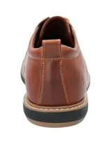 Zapato casual de cuero color marrón con cordones, costuras reforzadas y suela de EVA negra con detalle de vira clara.