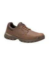 Zapato de cuero marrón Cat modelo Threshold Low, con cordones, suela de goma con tracción y logo de la marca en el lateral y la lengüeta.